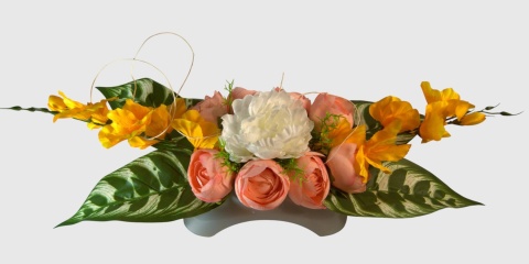 Wiązanka nagrobna z obciążeniem – elegancka dekoracja w ciepłych barwach